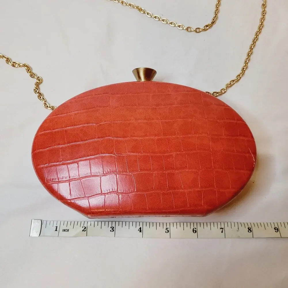 Sondra Roberts red croc embossed leather oval hard case cross body bag